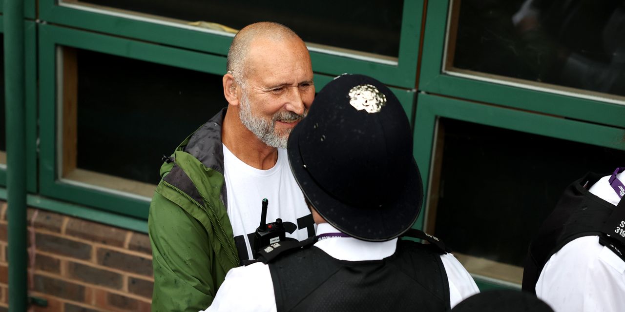 Just Stop Oil protesters disrupt Wimbledon tennis match