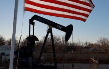 Oil prices nudge higher after first monthly gain since September