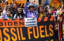 Tens of thousands march to demand end to fossil fuels ahead of UN climate summit