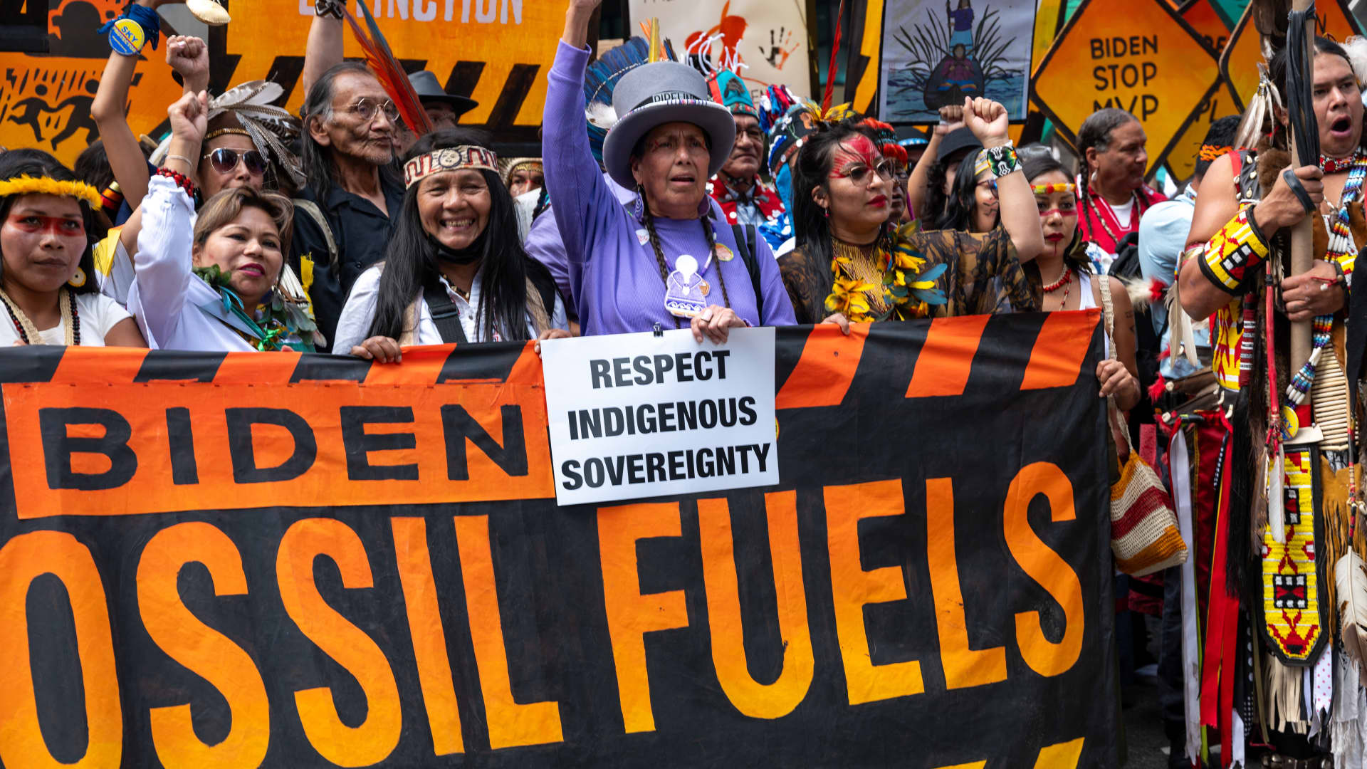 Tens of thousands march to demand end to fossil fuels ahead of UN climate summit