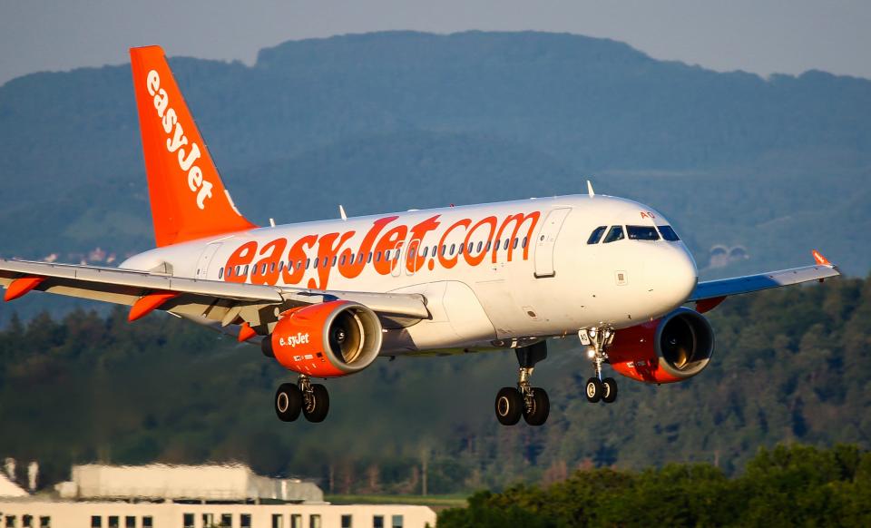 A couple were caught having sex in an EasyJet plane toilet and were met by police when they landed