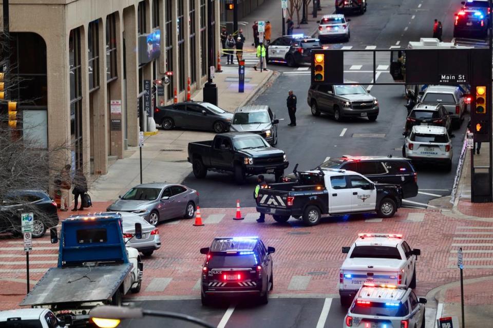 A view from 6th Street in downtown Fort Worth as firefighters, police and medics respond to an explosion at the Sandman Hotel on Houston Street.