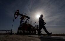 Oil prices fall as market shrugs off China growth pledge, OPEC+ production cuts