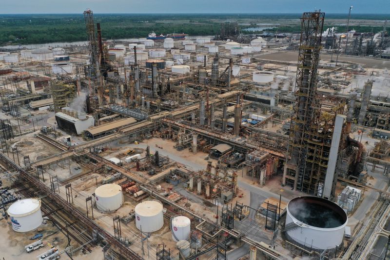Oil giants Exxon, Chevron lean on big-ticket deals to build bigger reserves