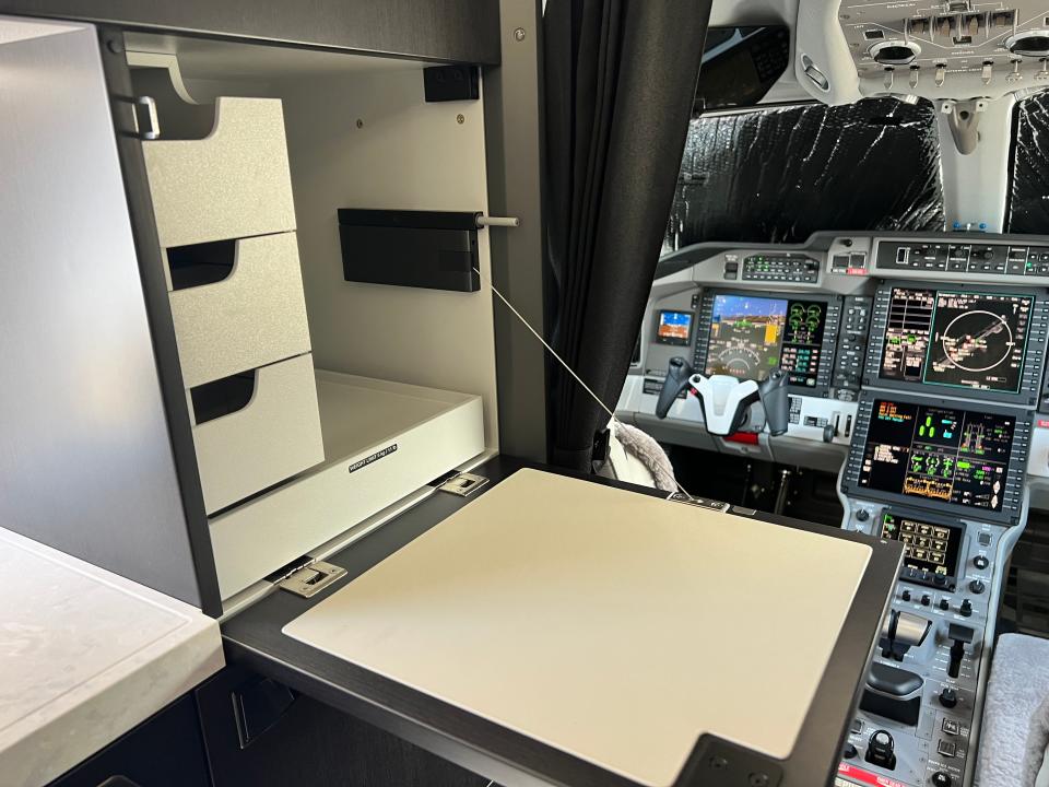 A storage area in the galley of a Pilatus PC-24