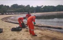 Singapore rushes to clean-up oil slick after boat hits fuel ship