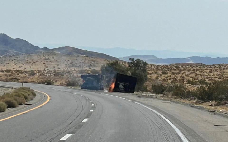 A big rig hauling lithium-ion batteries overturned and caught fire, prompting a full closure of the 15 Freeway between Barstow and Baker on Friday, July 26, 2024.