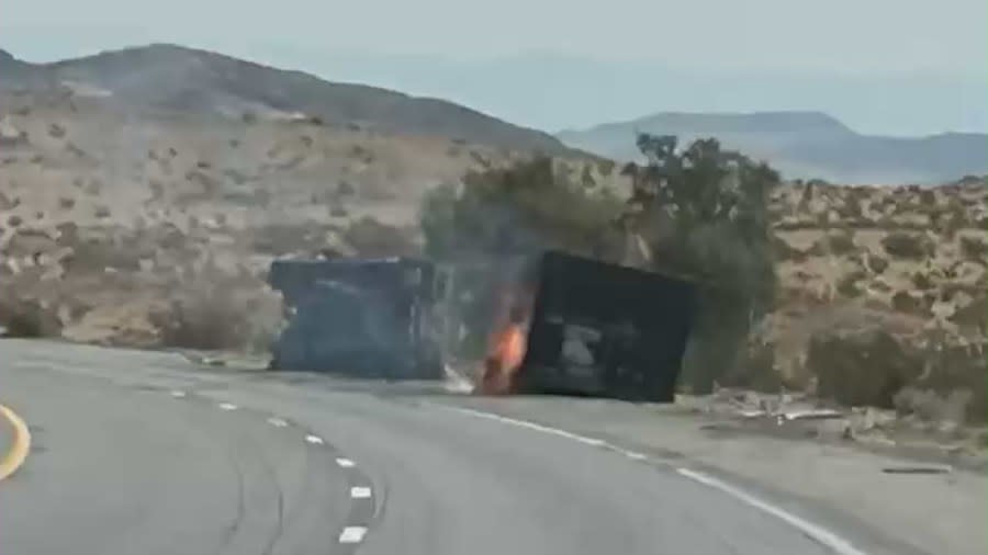 Photo of the big rig carrying lithium batteries that overturned and caught fire, causing a massive traffic backup on the I-15 Freeway on July 27, 2024. (California Highway Patrol)