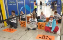 Just Stop Oil activists block Gatwick Airport departure gates in London