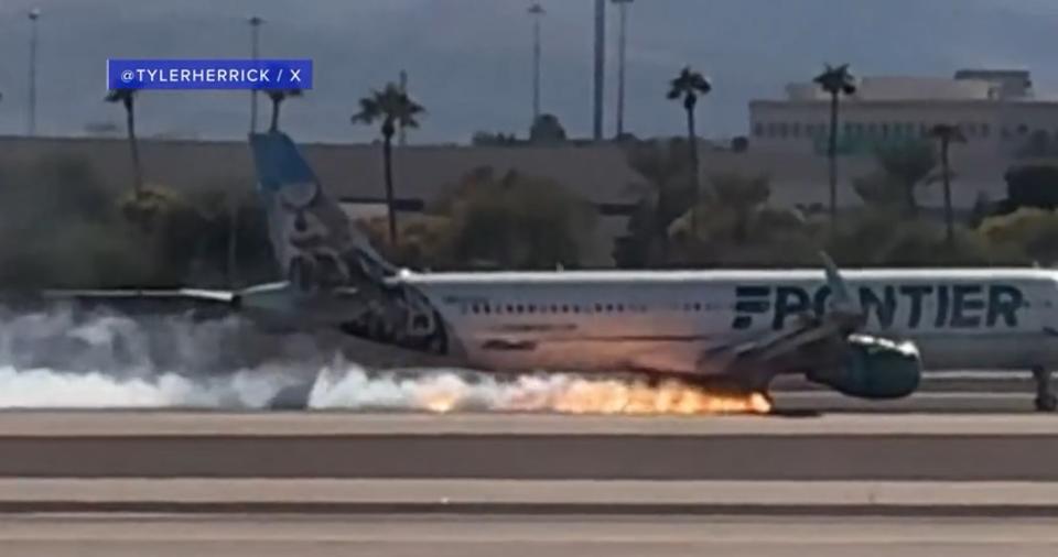 Flight catches fire while making hard landing at Harry Reid International Airport in Las Vegas