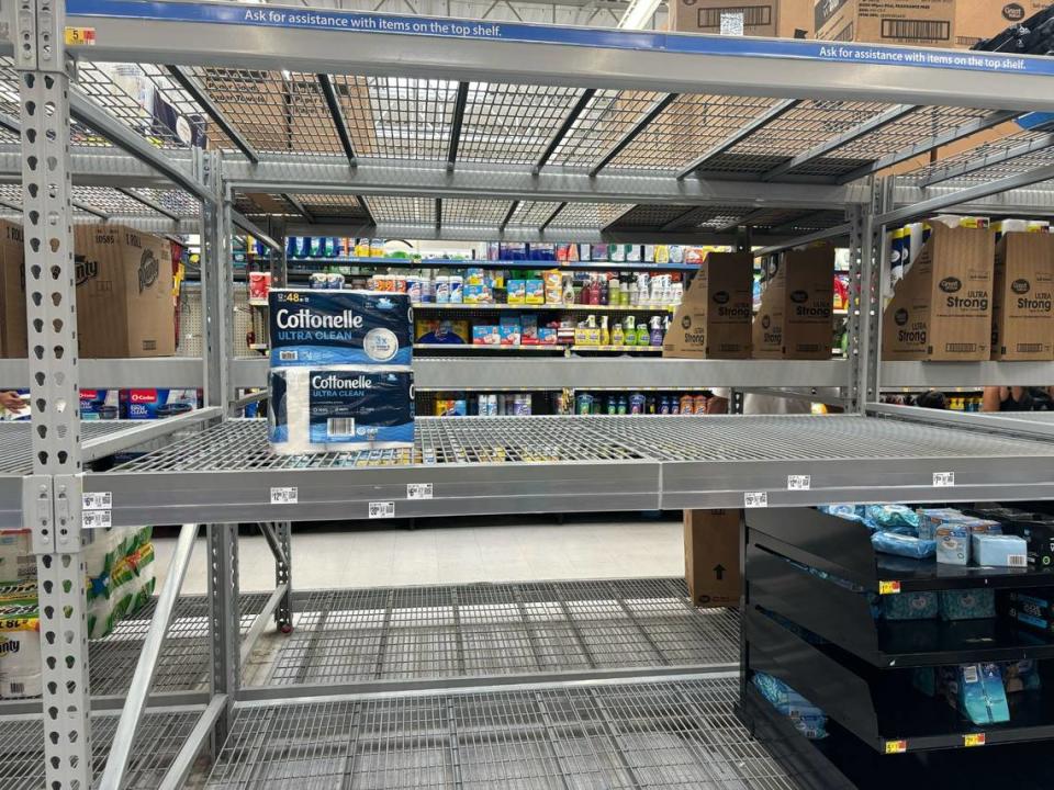 Shelves at a Myrtle Beach Walmart are bare of water and toilet paper Wednesday. Some grocery items are becoming low because of Hurricane Helene and panic buying. Oct. 2, 2024