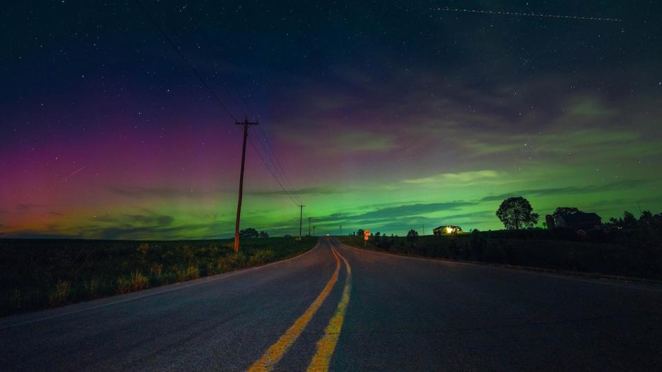 PHOTO: Wisconsin's night sky is glowing with the Northern Lights during a geomagnetic storm. (Ross Harried/NurPhoto via Getty Images)