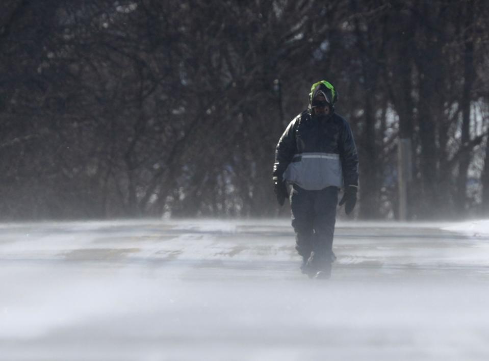 Dick Raab walks near High Cliff state Park during a polar vortex that brought extremely cold temperatures and dangerous wind chill temperatures on Wednesday, January 30, 2019, in Sherwood, Wis.