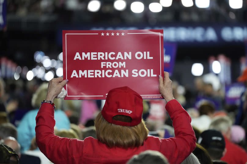 A delegate holds up a sign during the Republican National Convention.