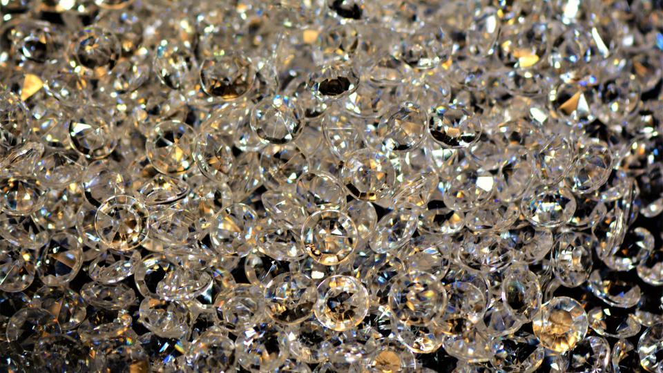 A pile of synthetic diamonds close up.