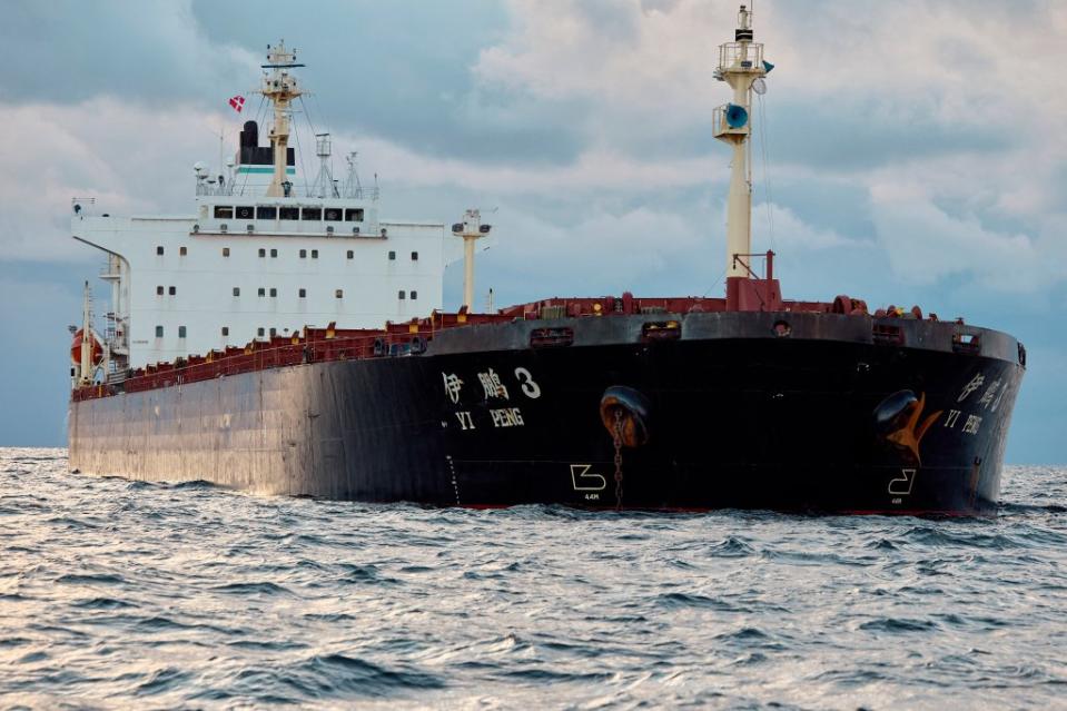 The Chinese ship, the bulk carrier Yi Peng 3 is anchored and being monitored by a Danish naval patrol vessel (unseen) in the sea of Kattegat, near the City og Granaa in Jutland, Denmark, on November 20, 2024. Denmark's navy said on November 20, 2024 it was shadowing a Chinese cargo vessel in the Baltic Sea, a day after Finland and Sweden opened investigations into suspected sabotage of two severed undersea telecoms cables. "The Danish Defence can confirm that we are present in the area near the Chinese ship Yi Peng 3," the military wrote in an email to AFP, adding that it would make no further comment for the time-being. (Photo by Mikkel Berg Pedersen / Ritzau Scanpix / AFP) / Denmark OUT (Photo by MIKKEL BERG PEDERSEN/Ritzau Scanpix/AFP via Getty Images)