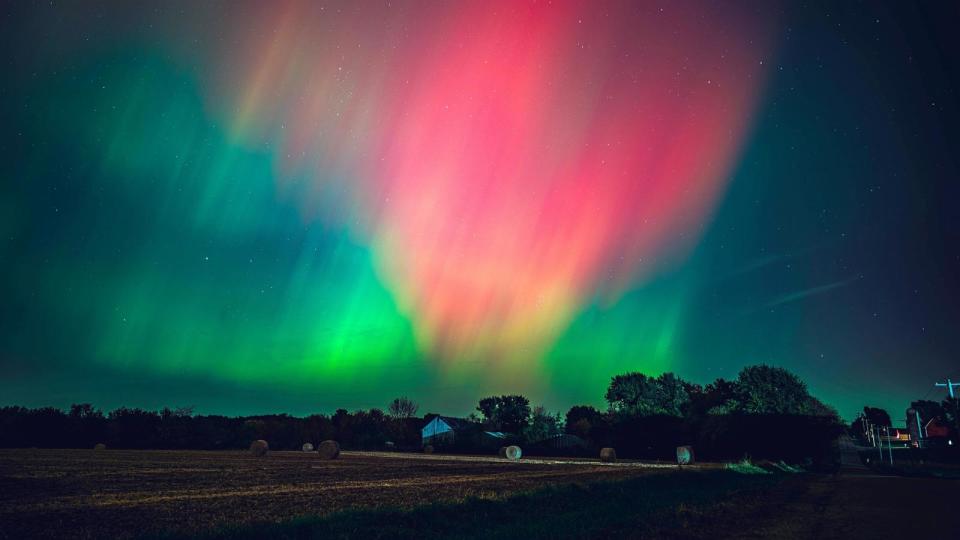 PHOTO: The night sky in Wisconsin glows with the Northern Lights. (Ross Harried/NurPhoto via Getty Images)