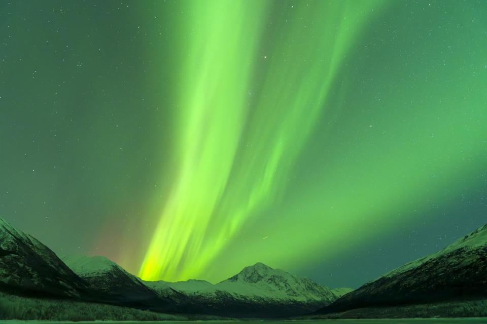 PHOTO: A view of the Northern Lights by the Eklutna Lake in Alaska, December 31, 2024. (Hasan Akbas/Anadolu via Getty Images)