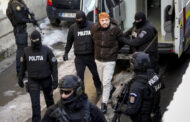 After 9 months on the run, a French fugitive who staged a deadly escape faced court in Romania