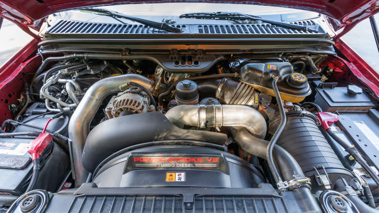 A Ford Power Stroke V8 diesel engine under a vehicle's hood