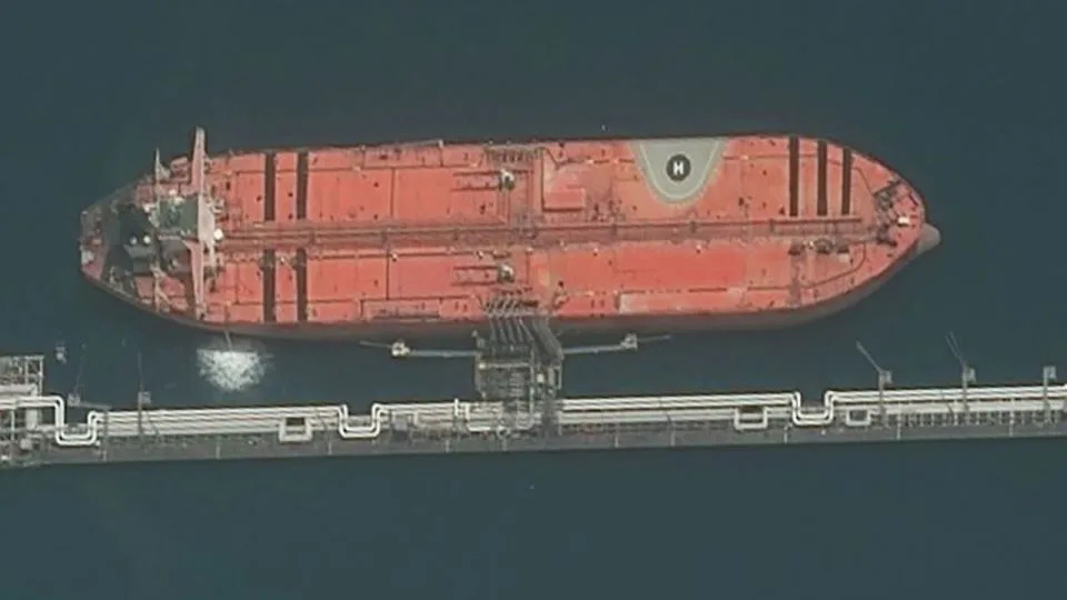 Recently intercepted tanker vessel MT Tifani seen docked at Iran's Kharg Island terminal on April 6, 2026. - Airbus