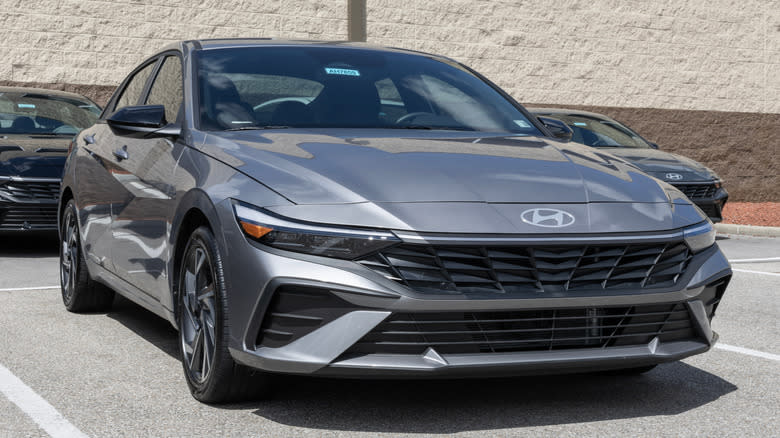 A Hyundai Elantra Hybrid SEL Sport FWD Sedan on display.