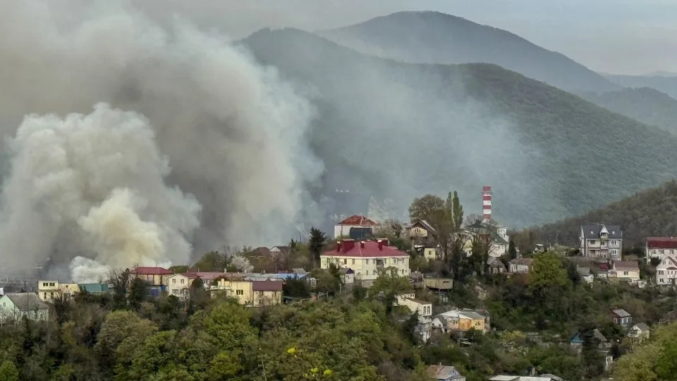 Smoke rises above buildings following a recent drone attack on the Tuapse oil refinery in Tuapse, Krasnodar region on April 29, 2026, amid the ongoing Russian-Ukrainian conflict. - Stringer/AFP/Getty Images