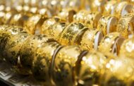 Gold rises as dollar, oil ease on U.S.-Iran deal prospects