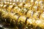 Gold rises as dollar, oil ease on U.S.-Iran deal prospects