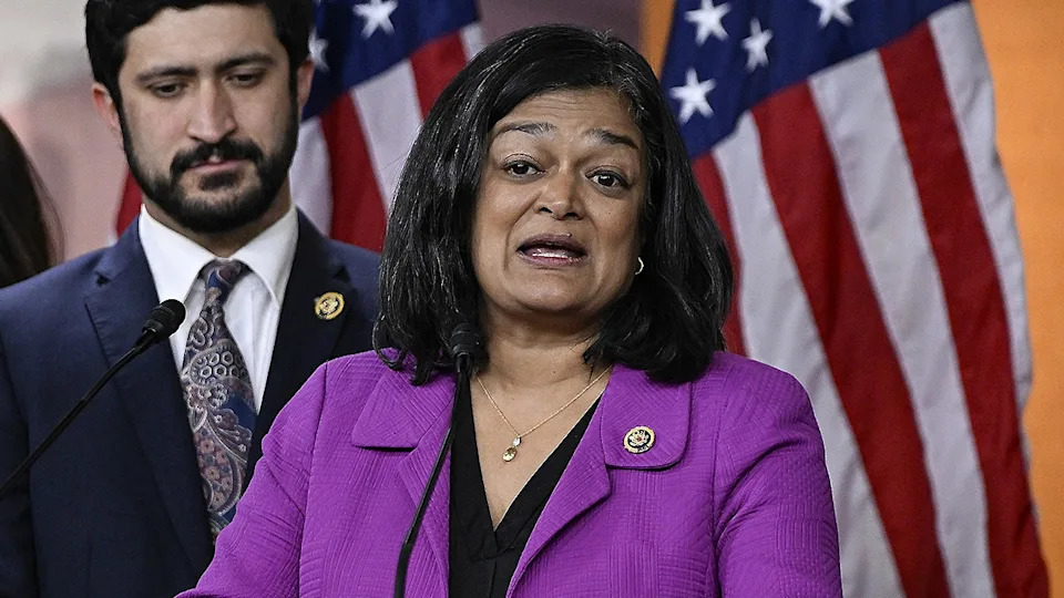 Rep. Pramila Jayapal speaking at a podium