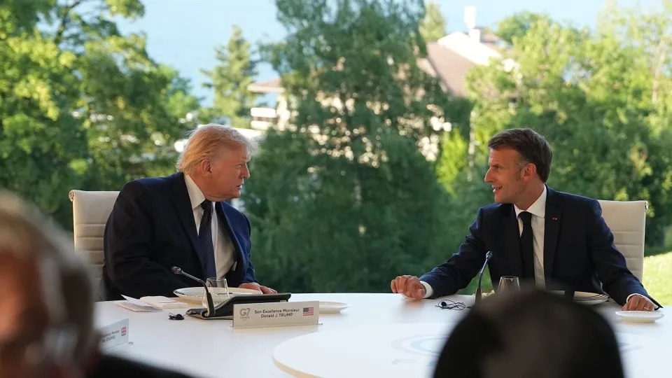 US President Donald Trump, left, and French President Emmanuel Macron during a working dinner at the G7 summit in Evian-les-Bains, France, on June 15, 2026. - Thibault Camus/AP