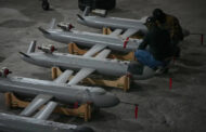 Ukrainian drone strikes kill 1 and spark fire at oil facility in Russia