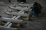 Ukrainian drone strikes kill 1 and spark fire at oil facility in Russia