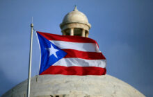 Puerto Rico roiled by widening political crisis as top official comes under fire