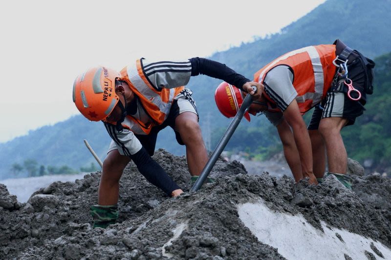 Nepal teams seek hundreds trapped in hydropower tunnels after deadly floods